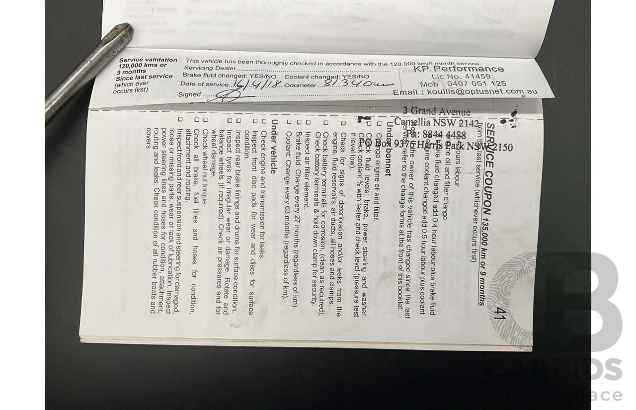 9/2012 Holden Barina TM 5d Hatchback Bocaray Blue Metallic 1.6L