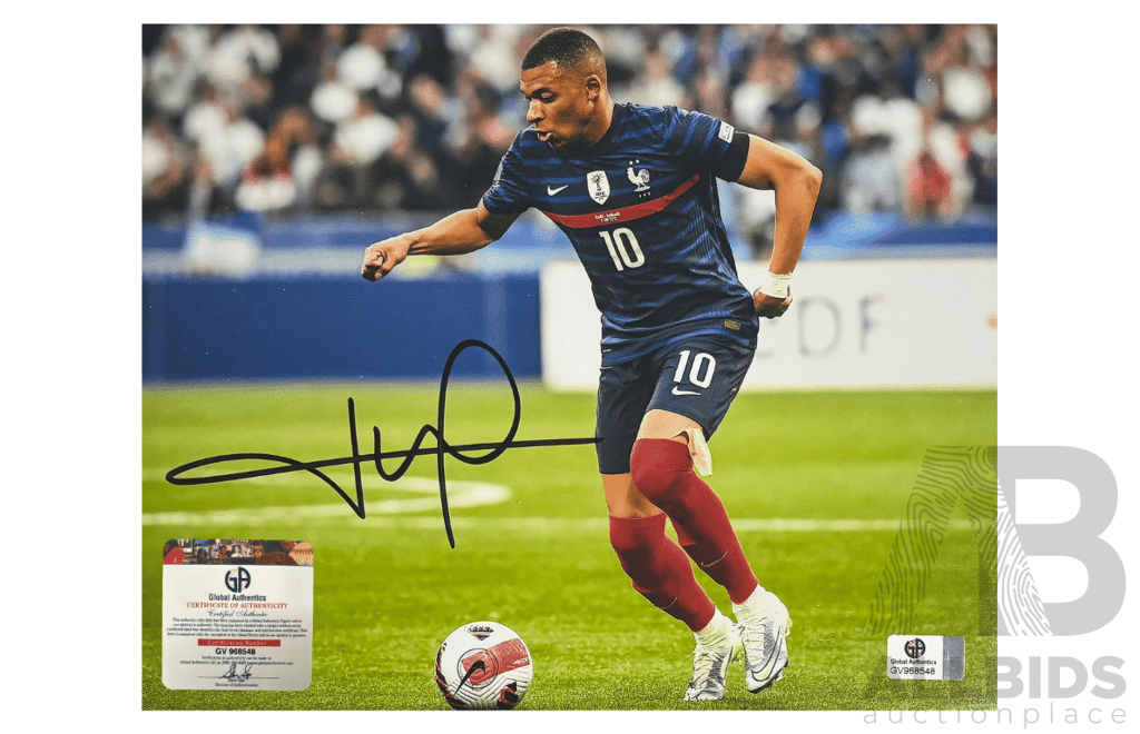 Kylian Mbappé Action Photo Boldly Signed with Premium Authentication.