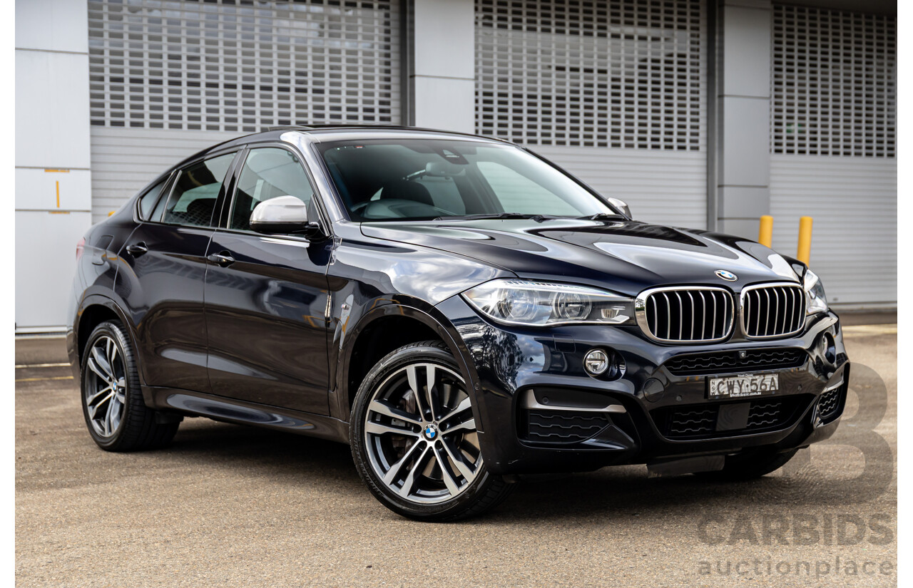 11/2014 BMW X6 M50d E71 MY14 4d Coupe Carbon Black Metallic Triple Turbo Diesel 3.0L