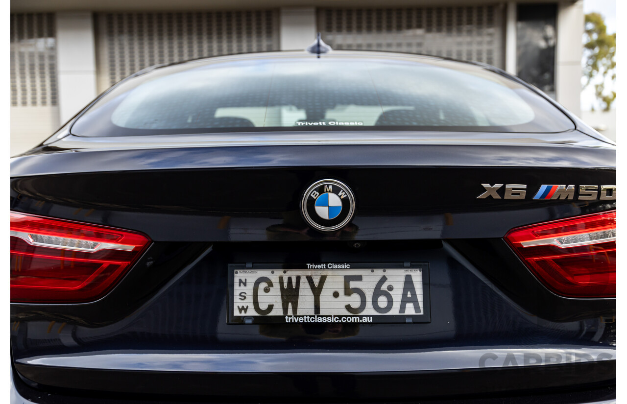 11/2014 BMW X6 M50d E71 MY14 4d Coupe Carbon Black Metallic Triple Turbo Diesel 3.0L
