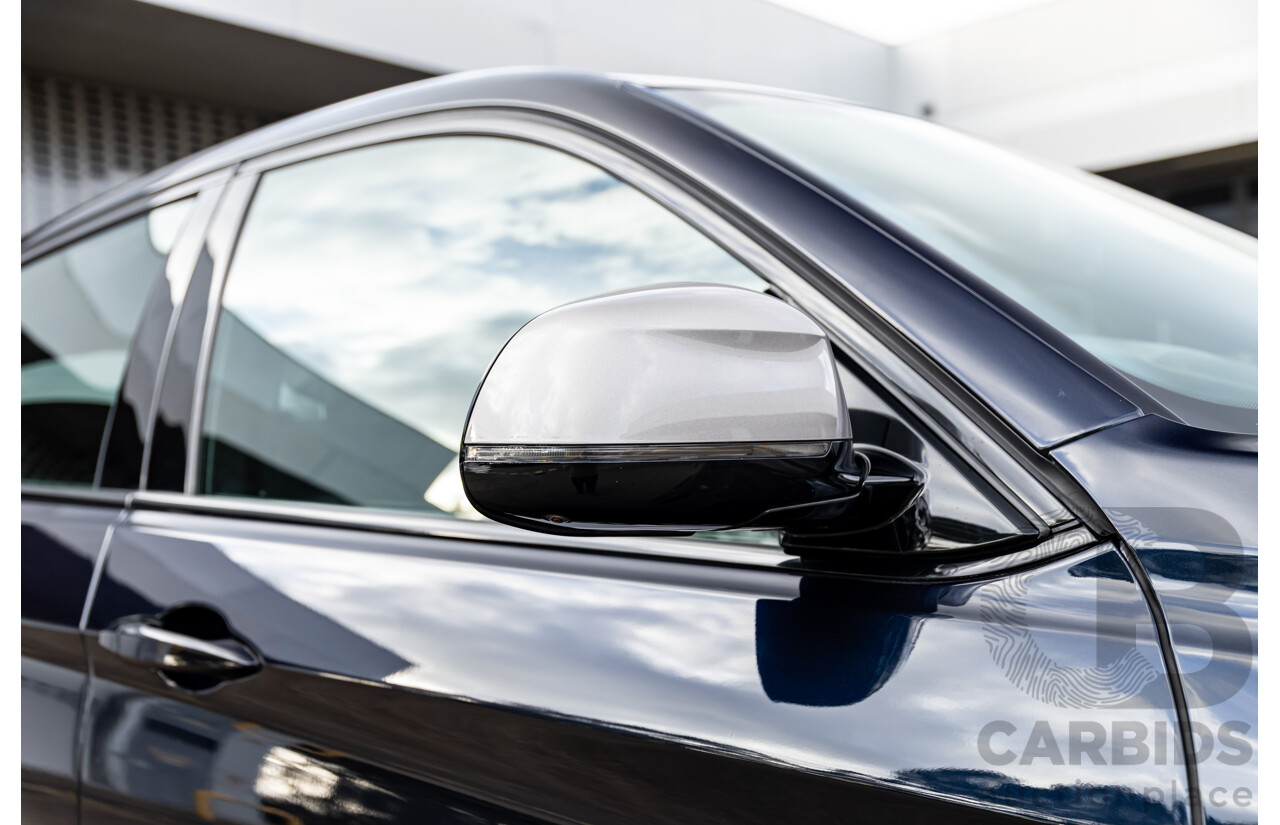 11/2014 BMW X6 M50d E71 MY14 4d Coupe Carbon Black Metallic Triple Turbo Diesel 3.0L