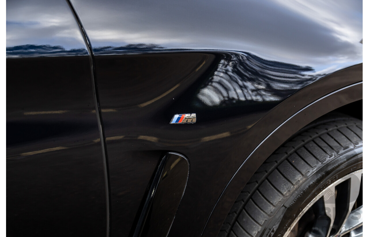 11/2014 BMW X6 M50d E71 MY14 4d Coupe Carbon Black Metallic Triple Turbo Diesel 3.0L