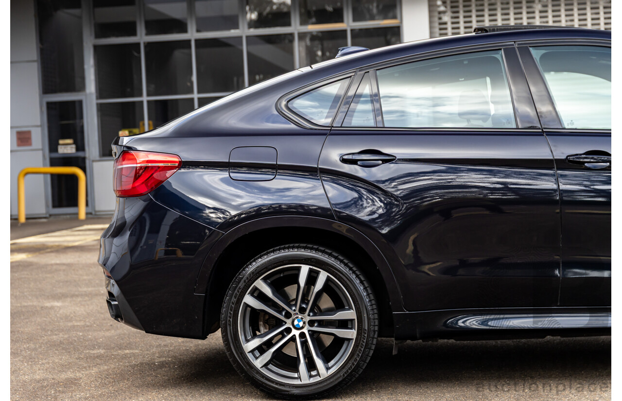 11/2014 BMW X6 M50d E71 MY14 4d Coupe Carbon Black Metallic Triple Turbo Diesel 3.0L