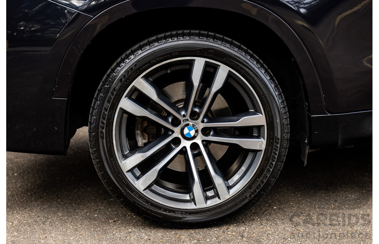 11/2014 BMW X6 M50d E71 MY14 4d Coupe Carbon Black Metallic Triple Turbo Diesel 3.0L