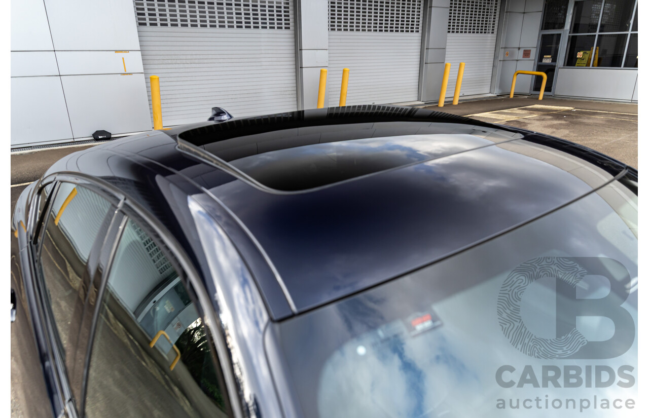 11/2014 BMW X6 M50d E71 MY14 4d Coupe Carbon Black Metallic Triple Turbo Diesel 3.0L