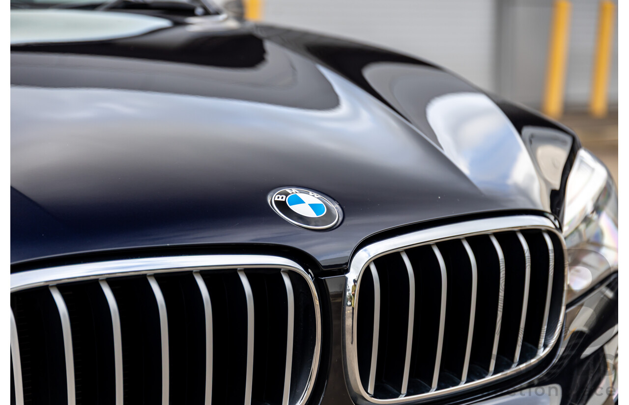11/2014 BMW X6 M50d E71 MY14 4d Coupe Carbon Black Metallic Triple Turbo Diesel 3.0L