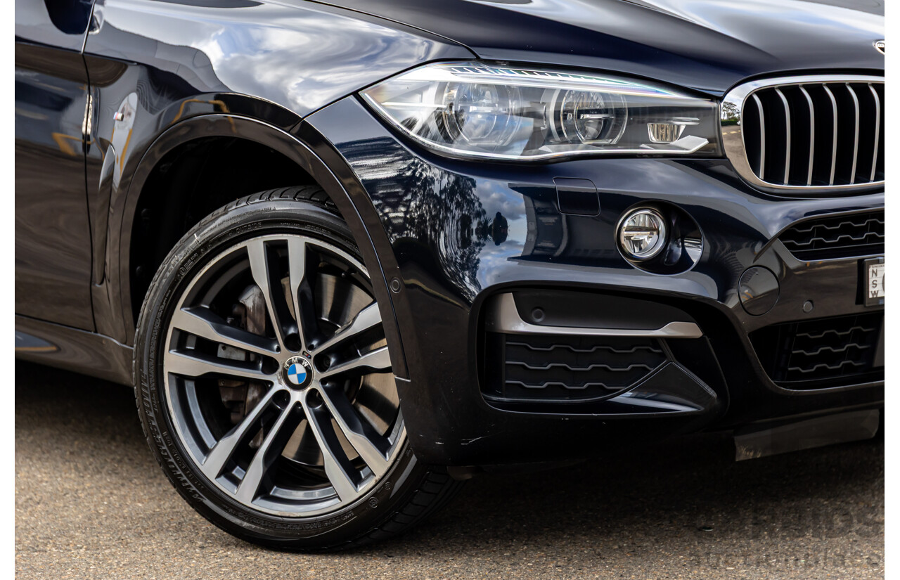 11/2014 BMW X6 M50d E71 MY14 4d Coupe Carbon Black Metallic Triple Turbo Diesel 3.0L