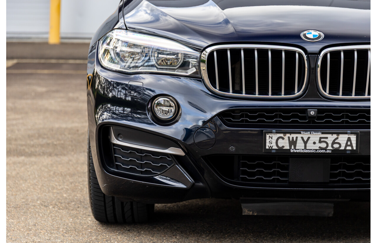 11/2014 BMW X6 M50d E71 MY14 4d Coupe Carbon Black Metallic Triple Turbo Diesel 3.0L