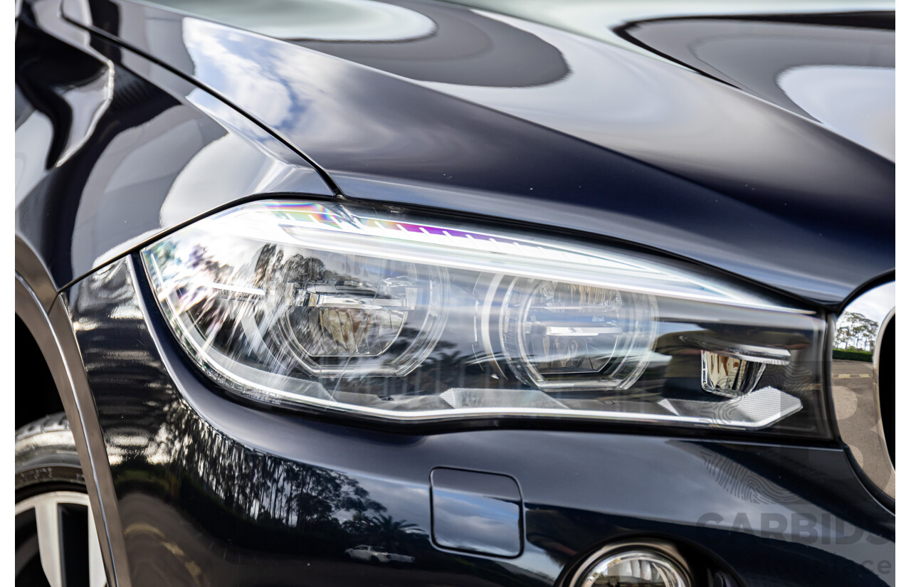 11/2014 BMW X6 M50d E71 MY14 4d Coupe Carbon Black Metallic Triple Turbo Diesel 3.0L