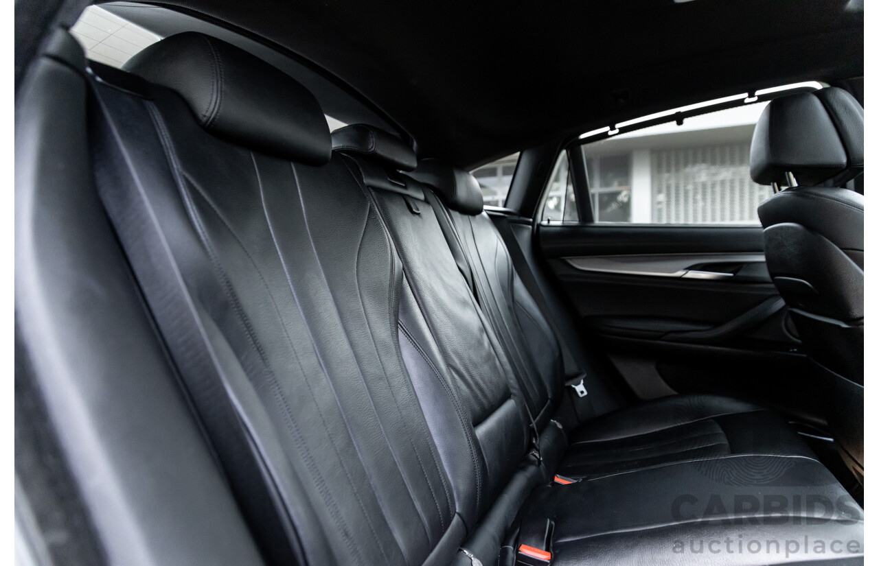 11/2014 BMW X6 M50d E71 MY14 4d Coupe Carbon Black Metallic Triple Turbo Diesel 3.0L