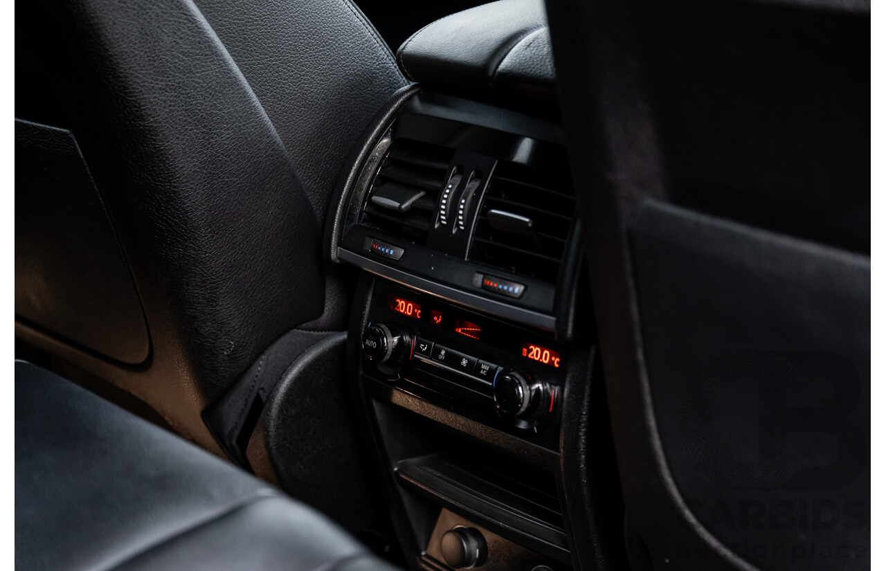 11/2014 BMW X6 M50d E71 MY14 4d Coupe Carbon Black Metallic Triple Turbo Diesel 3.0L