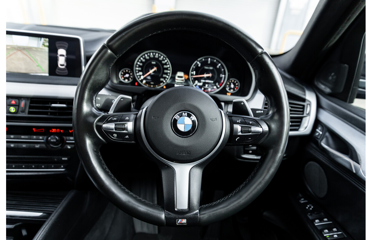 11/2014 BMW X6 M50d E71 MY14 4d Coupe Carbon Black Metallic Triple Turbo Diesel 3.0L