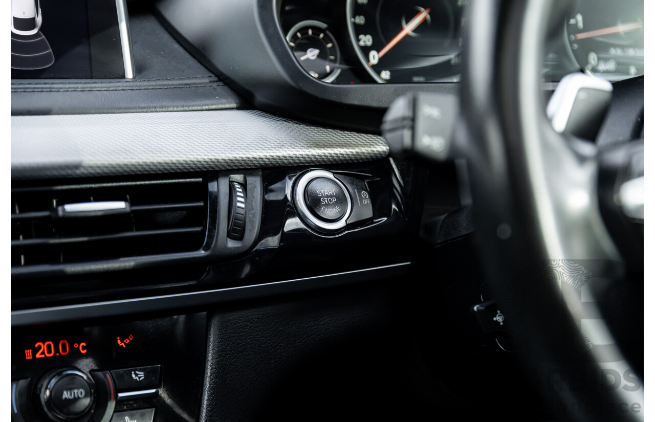 11/2014 BMW X6 M50d E71 MY14 4d Coupe Carbon Black Metallic Triple Turbo Diesel 3.0L