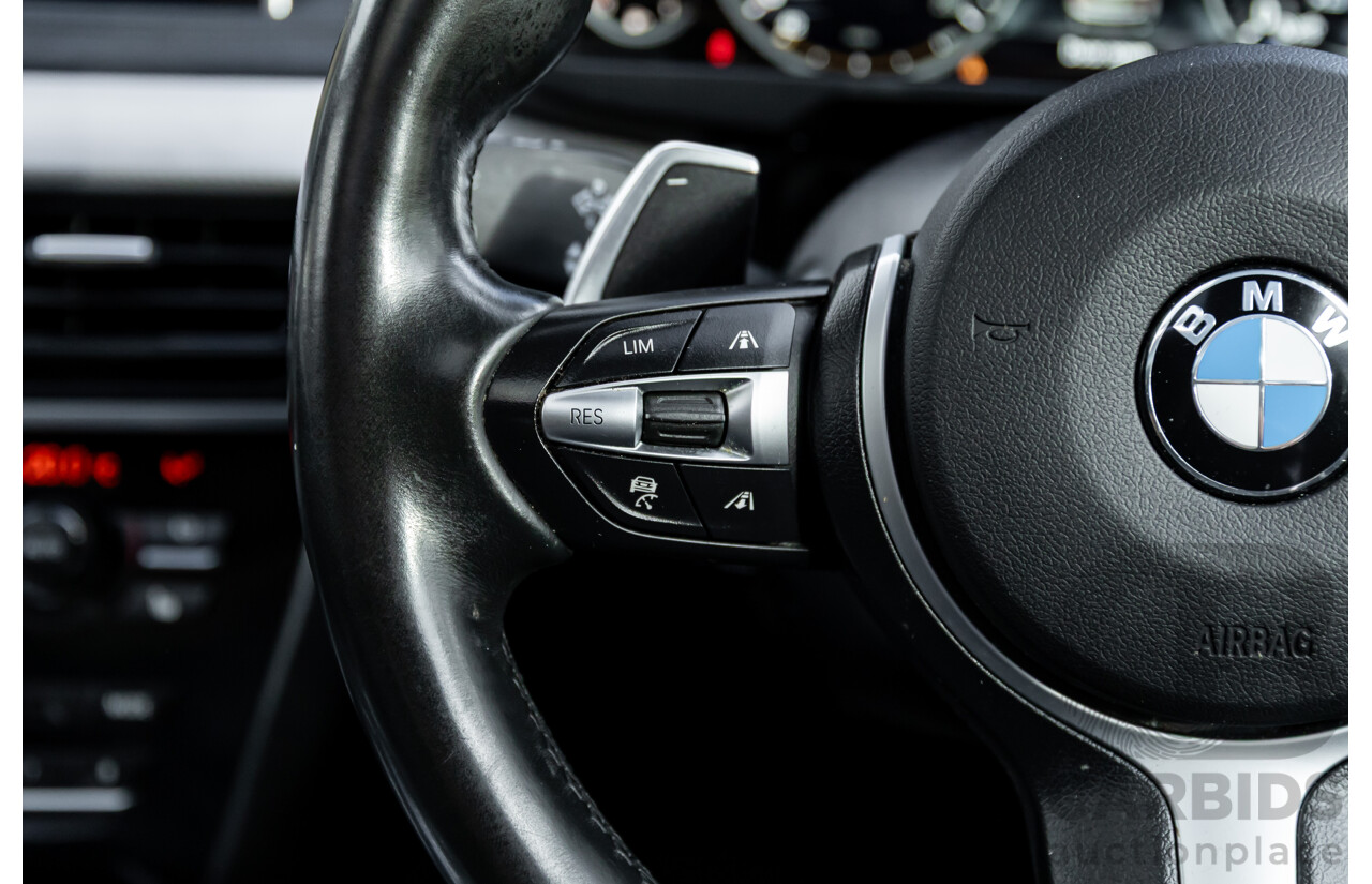 11/2014 BMW X6 M50d E71 MY14 4d Coupe Carbon Black Metallic Triple Turbo Diesel 3.0L