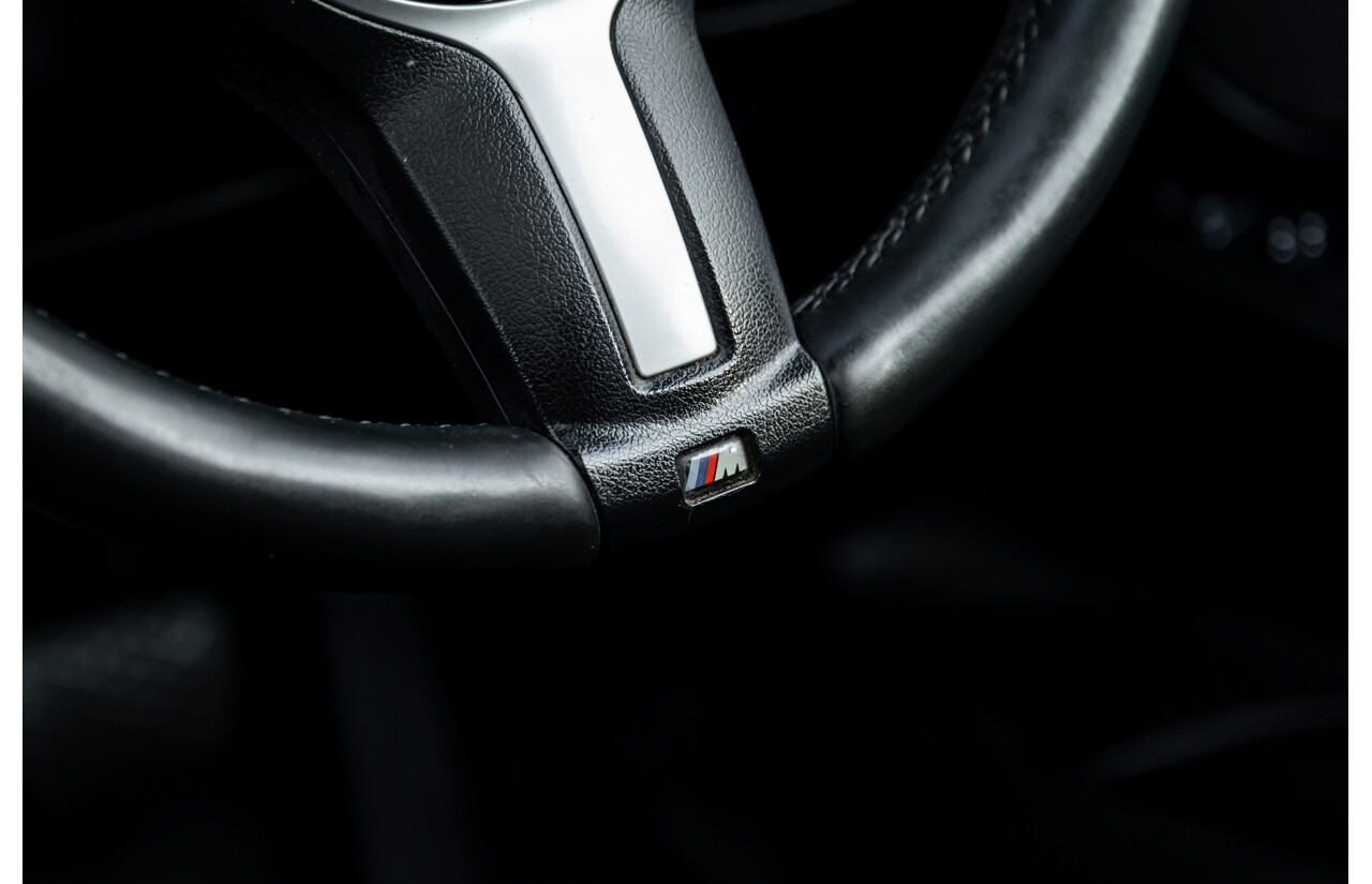 11/2014 BMW X6 M50d E71 MY14 4d Coupe Carbon Black Metallic Triple Turbo Diesel 3.0L