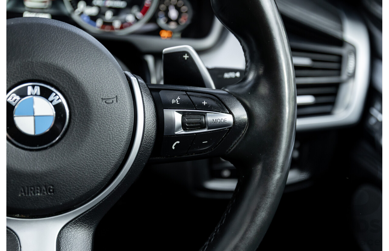 11/2014 BMW X6 M50d E71 MY14 4d Coupe Carbon Black Metallic Triple Turbo Diesel 3.0L