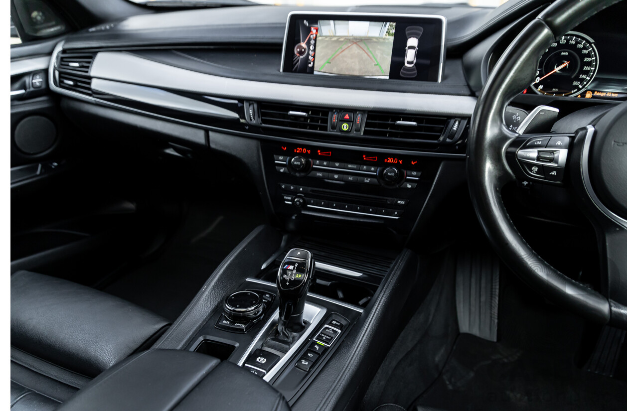 11/2014 BMW X6 M50d E71 MY14 4d Coupe Carbon Black Metallic Triple Turbo Diesel 3.0L