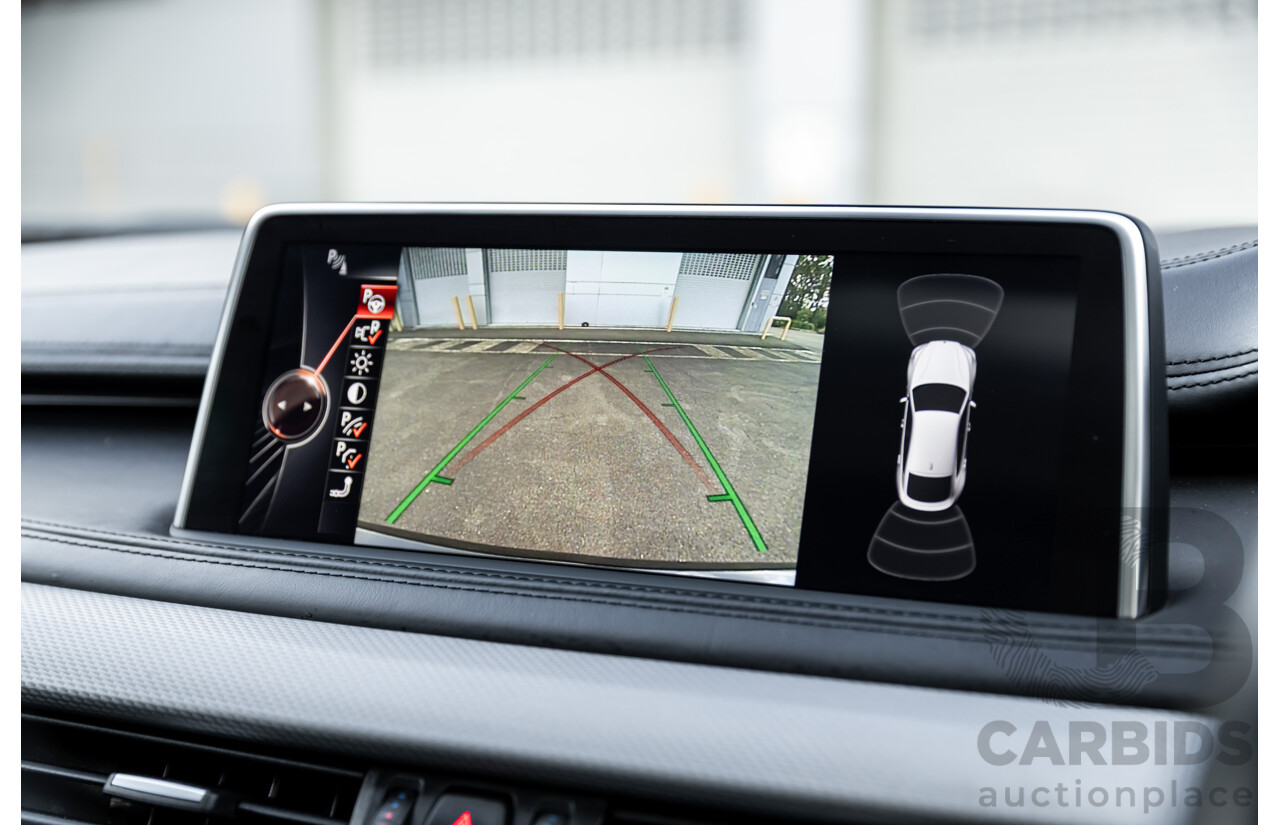 11/2014 BMW X6 M50d E71 MY14 4d Coupe Carbon Black Metallic Triple Turbo Diesel 3.0L