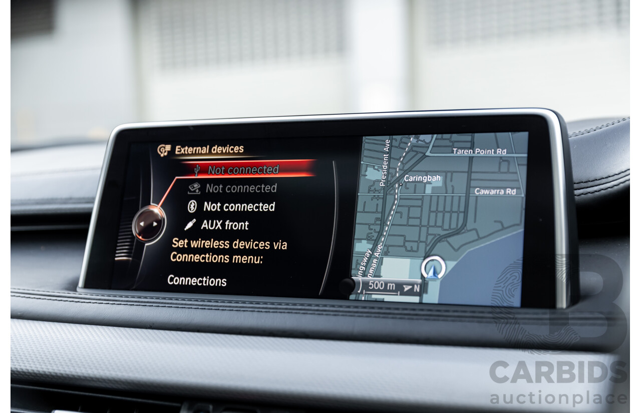 11/2014 BMW X6 M50d E71 MY14 4d Coupe Carbon Black Metallic Triple Turbo Diesel 3.0L