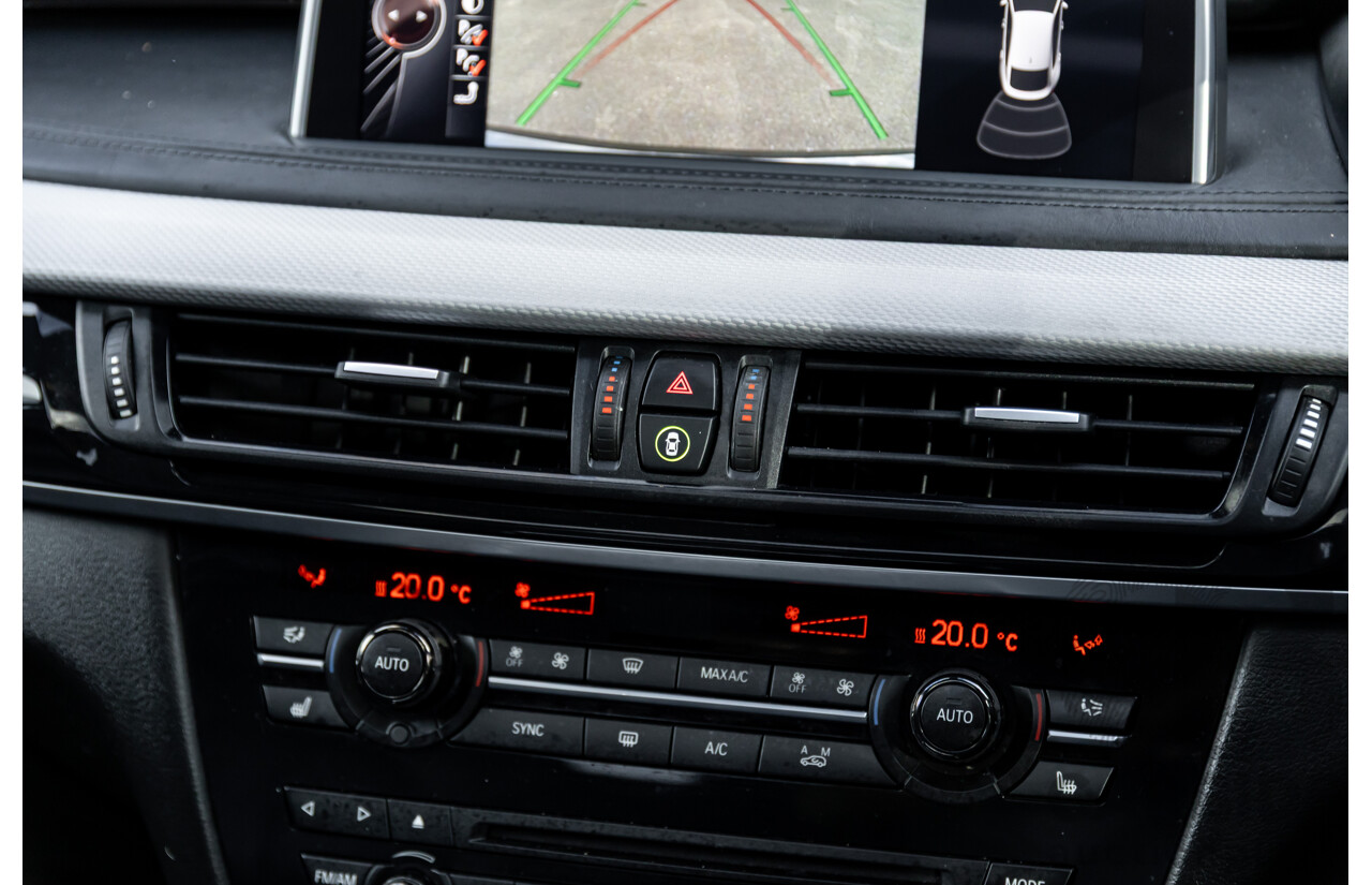 11/2014 BMW X6 M50d E71 MY14 4d Coupe Carbon Black Metallic Triple Turbo Diesel 3.0L