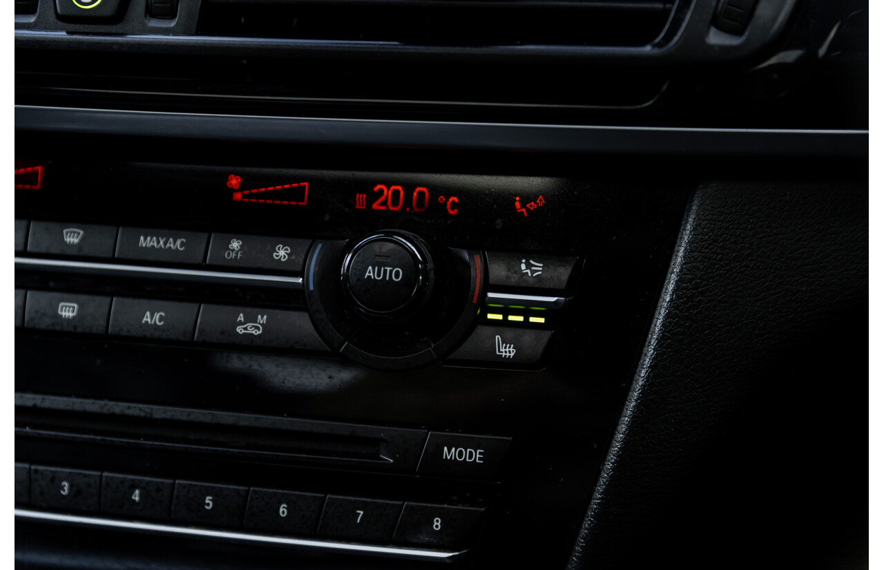 11/2014 BMW X6 M50d E71 MY14 4d Coupe Carbon Black Metallic Triple Turbo Diesel 3.0L