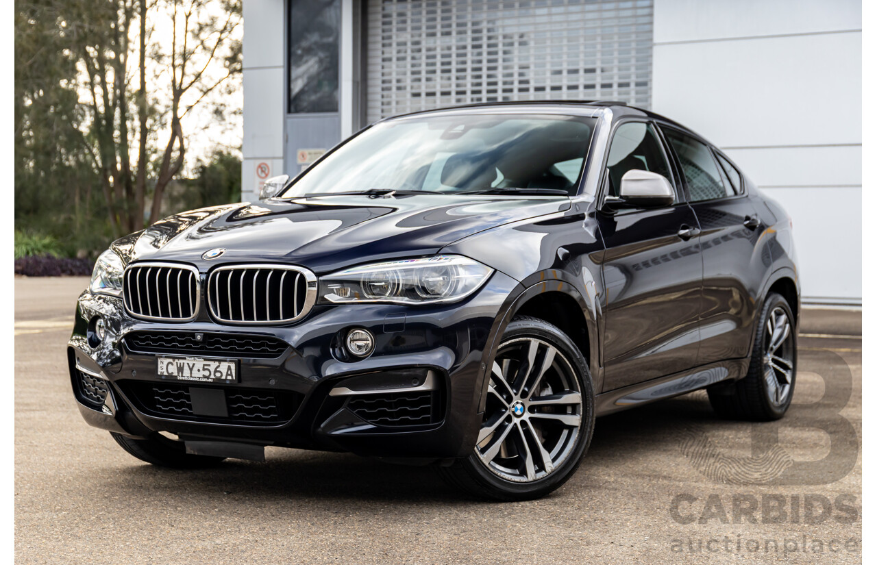 11/2014 BMW X6 M50d E71 MY14 4d Coupe Carbon Black Metallic Triple Turbo Diesel 3.0L