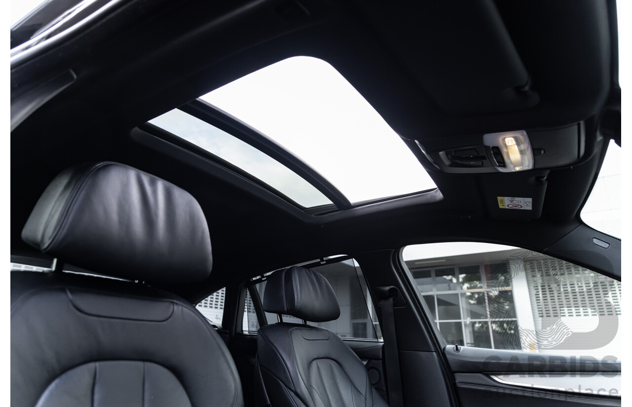 11/2014 BMW X6 M50d E71 MY14 4d Coupe Carbon Black Metallic Triple Turbo Diesel 3.0L