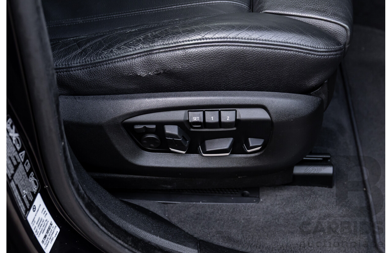 11/2014 BMW X6 M50d E71 MY14 4d Coupe Carbon Black Metallic Triple Turbo Diesel 3.0L