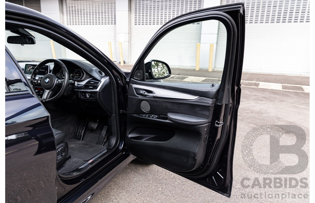 11/2014 BMW X6 M50d E71 MY14 4d Coupe Carbon Black Metallic Triple Turbo Diesel 3.0L