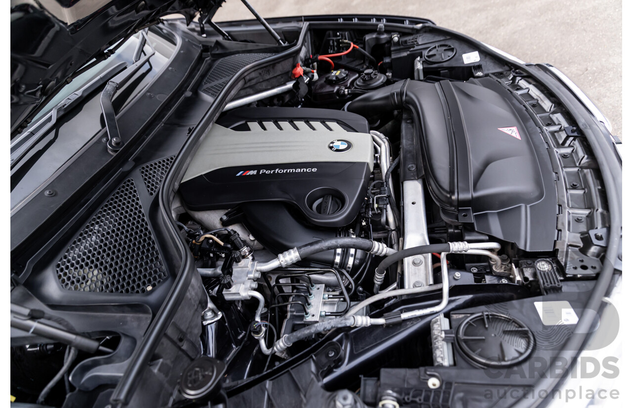 11/2014 BMW X6 M50d E71 MY14 4d Coupe Carbon Black Metallic Triple Turbo Diesel 3.0L