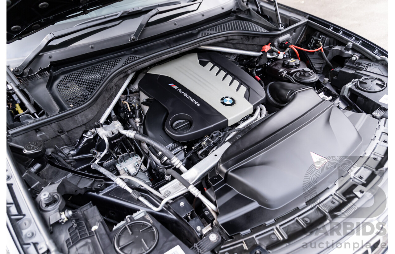 11/2014 BMW X6 M50d E71 MY14 4d Coupe Carbon Black Metallic Triple Turbo Diesel 3.0L