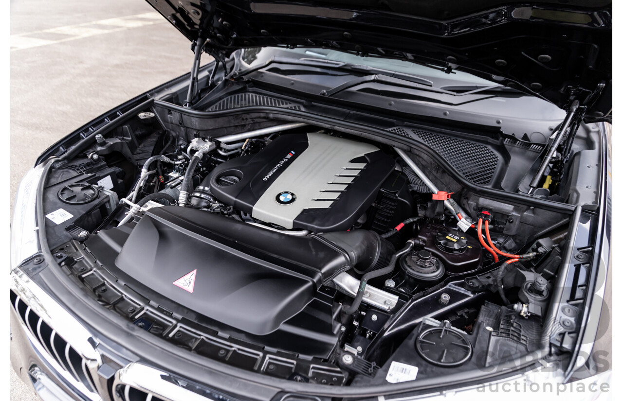 11/2014 BMW X6 M50d E71 MY14 4d Coupe Carbon Black Metallic Triple Turbo Diesel 3.0L