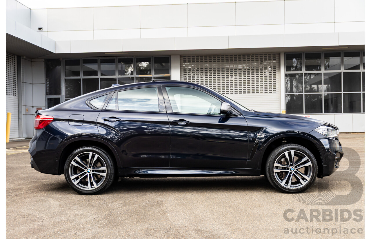 11/2014 BMW X6 M50d E71 MY14 4d Coupe Carbon Black Metallic Triple Turbo Diesel 3.0L