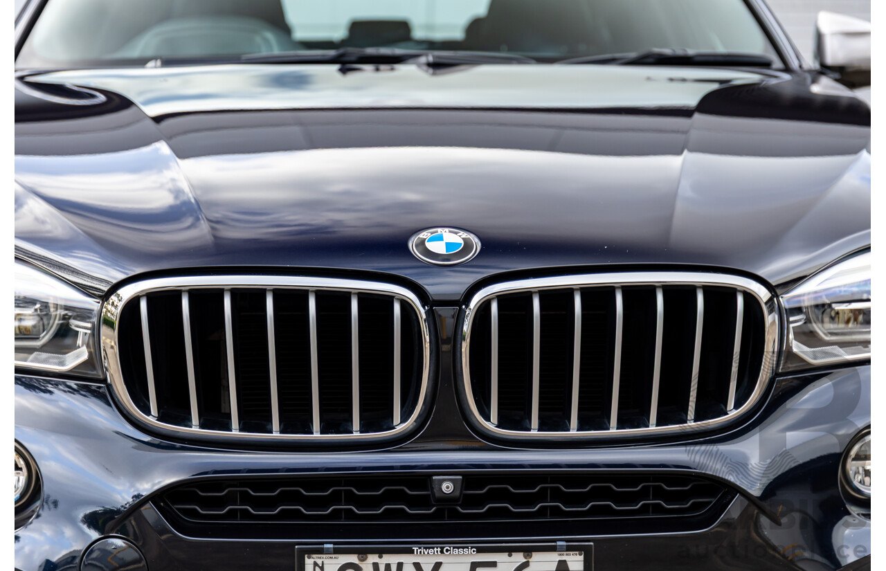11/2014 BMW X6 M50d E71 MY14 4d Coupe Carbon Black Metallic Triple Turbo Diesel 3.0L