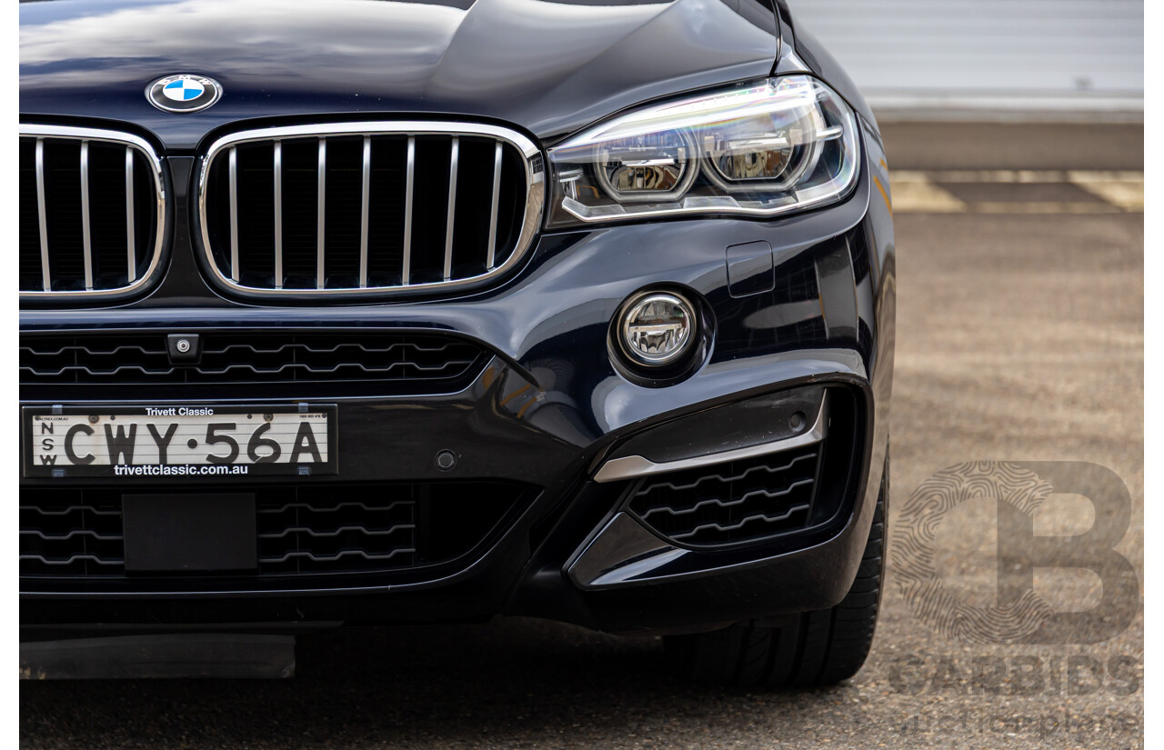 11/2014 BMW X6 M50d E71 MY14 4d Coupe Carbon Black Metallic Triple Turbo Diesel 3.0L