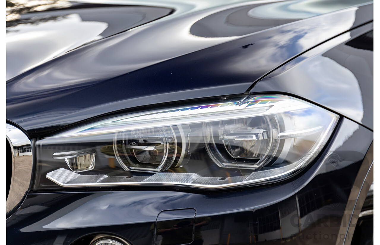 11/2014 BMW X6 M50d E71 MY14 4d Coupe Carbon Black Metallic Triple Turbo Diesel 3.0L