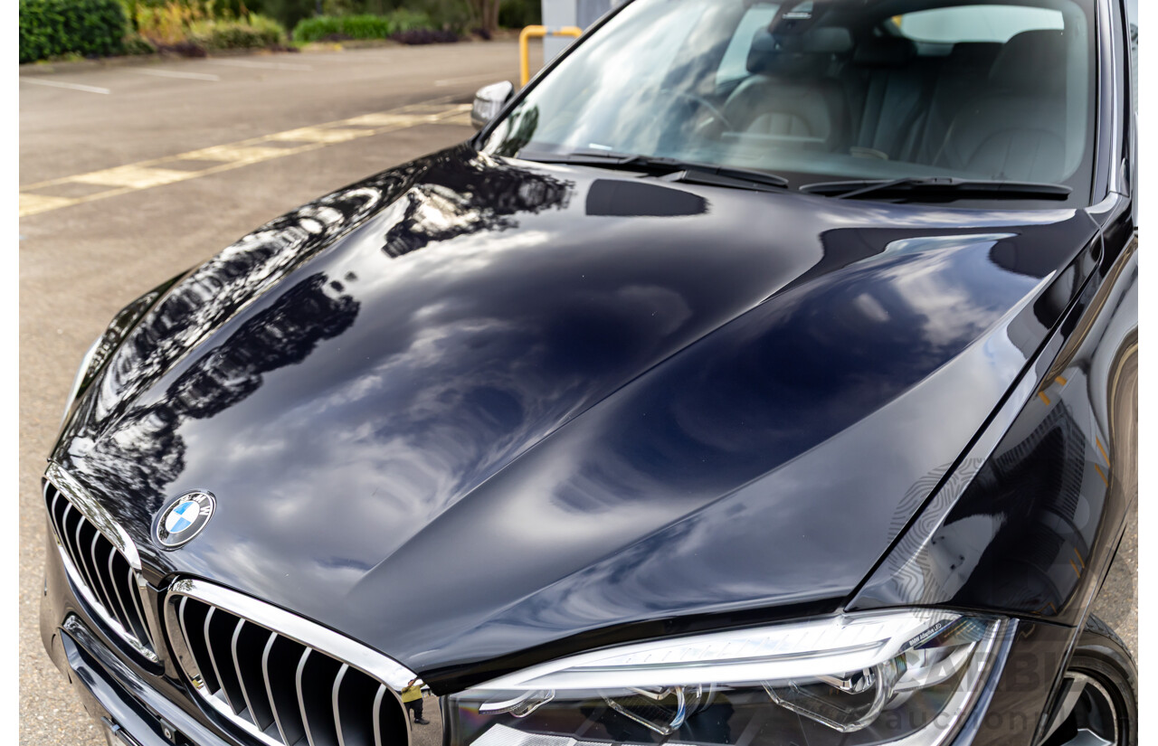 11/2014 BMW X6 M50d E71 MY14 4d Coupe Carbon Black Metallic Triple Turbo Diesel 3.0L