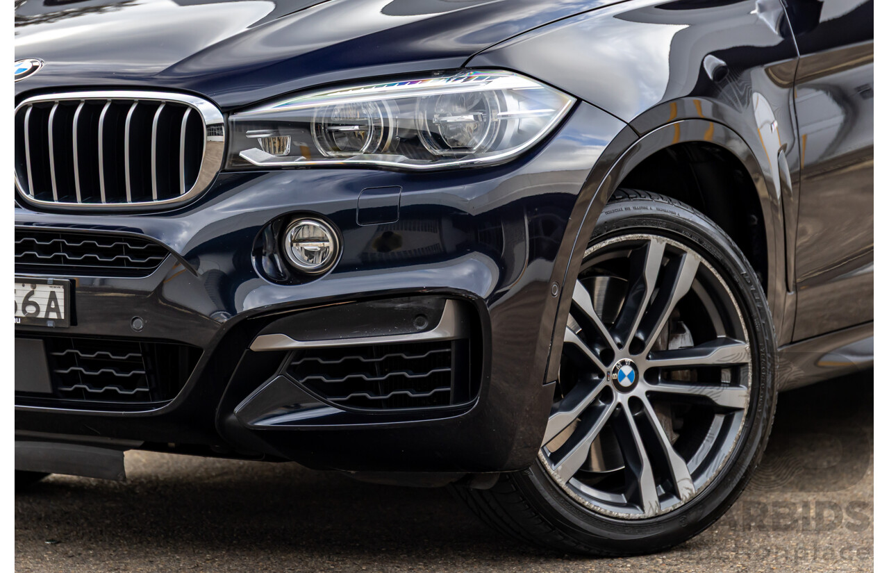 11/2014 BMW X6 M50d E71 MY14 4d Coupe Carbon Black Metallic Triple Turbo Diesel 3.0L