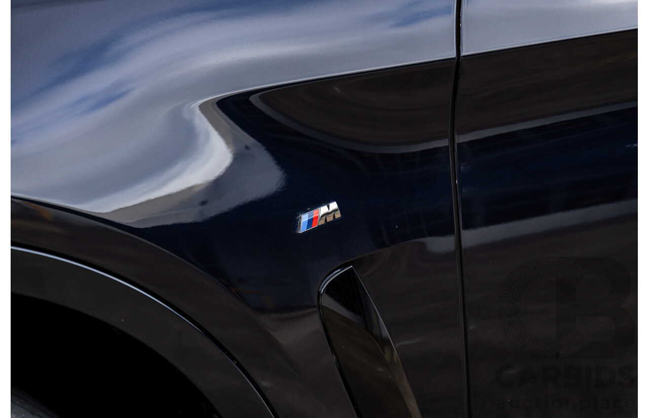 11/2014 BMW X6 M50d E71 MY14 4d Coupe Carbon Black Metallic Triple Turbo Diesel 3.0L