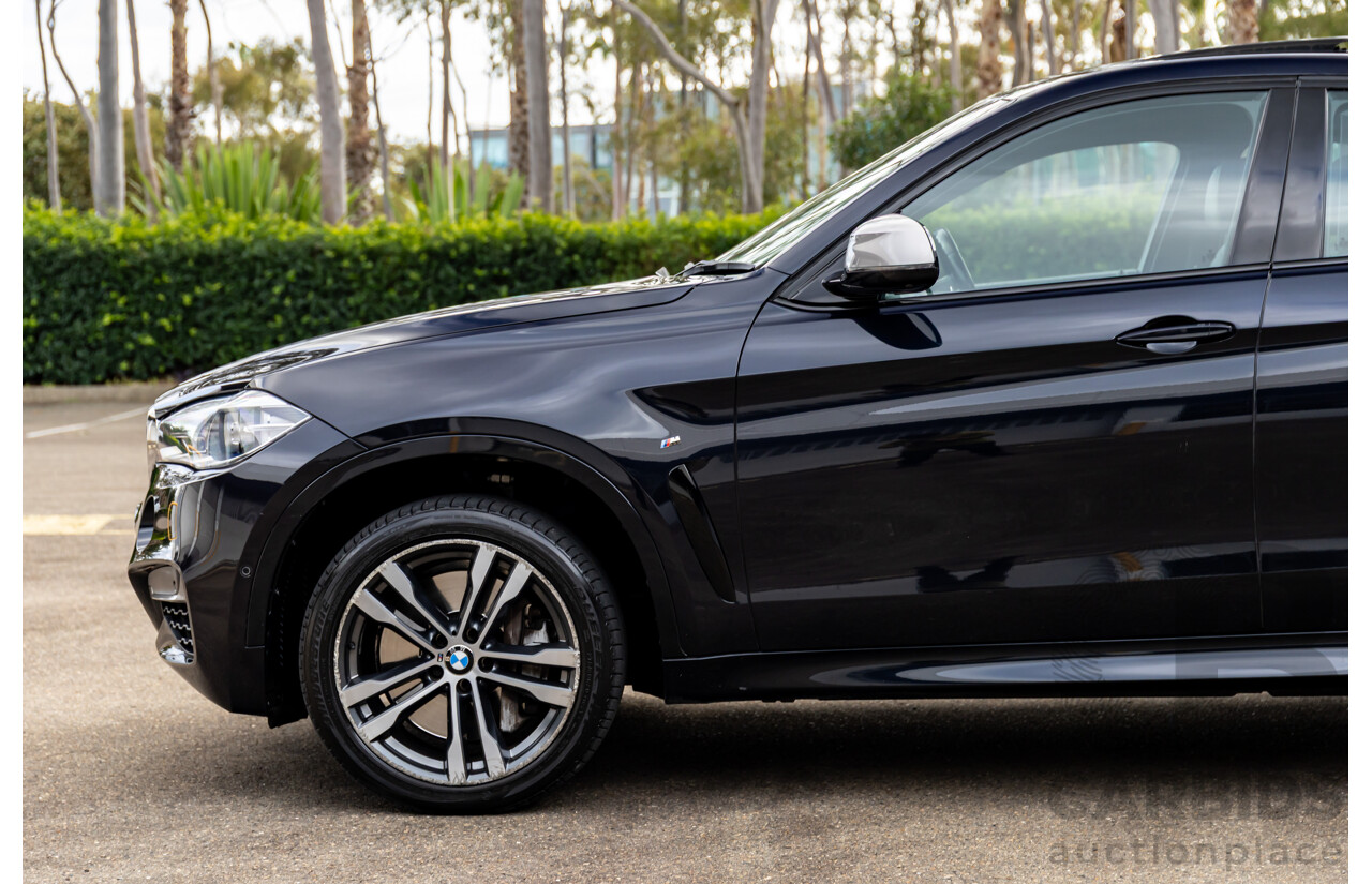 11/2014 BMW X6 M50d E71 MY14 4d Coupe Carbon Black Metallic Triple Turbo Diesel 3.0L