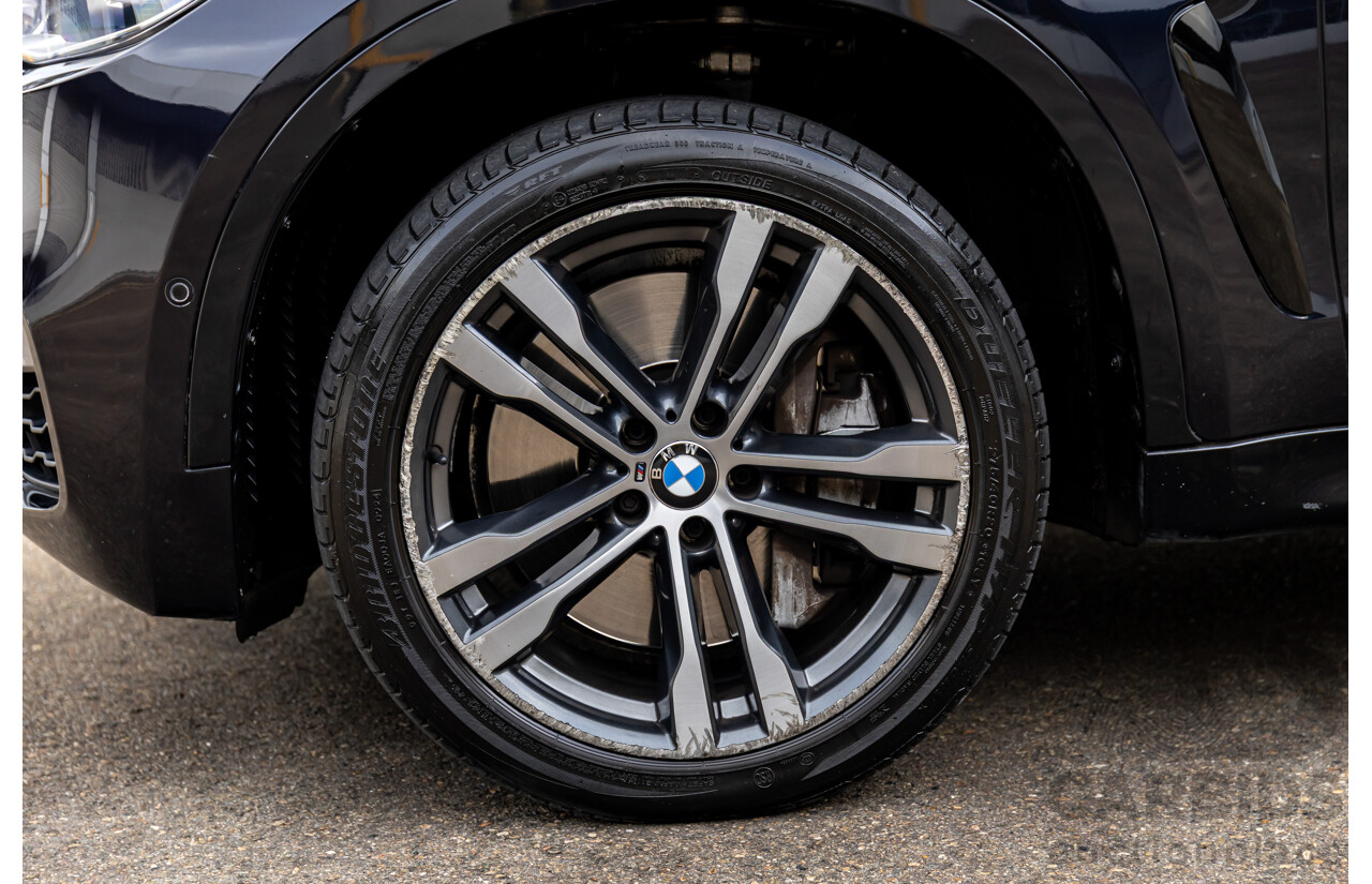 11/2014 BMW X6 M50d E71 MY14 4d Coupe Carbon Black Metallic Triple Turbo Diesel 3.0L