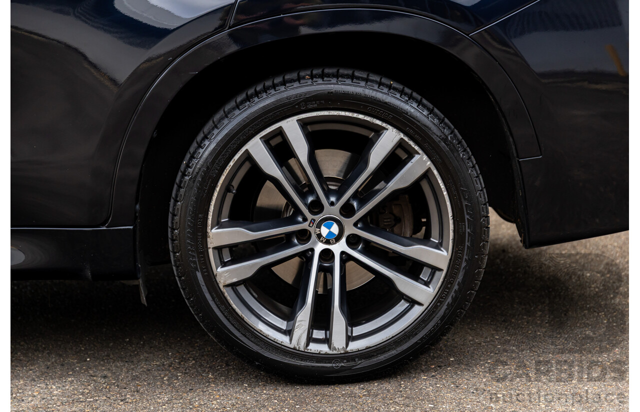 11/2014 BMW X6 M50d E71 MY14 4d Coupe Carbon Black Metallic Triple Turbo Diesel 3.0L
