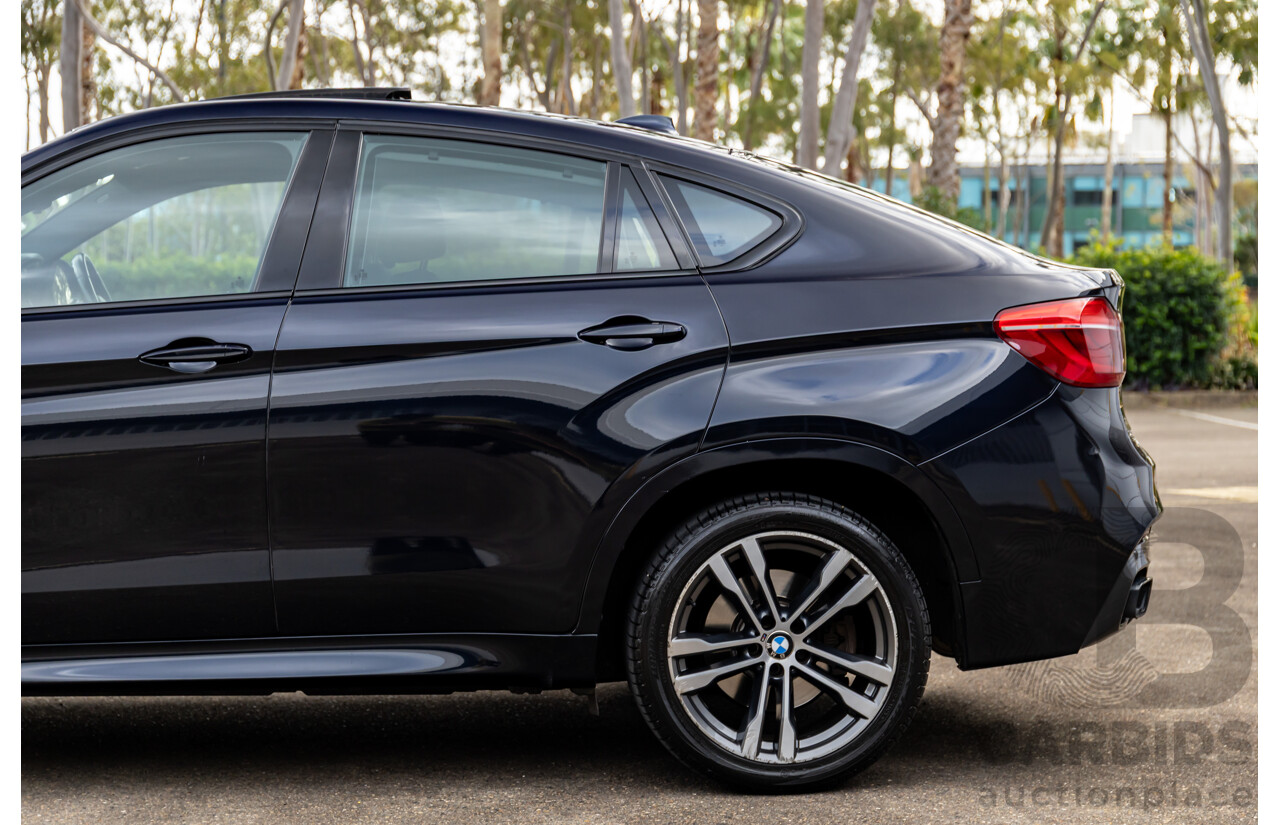 11/2014 BMW X6 M50d E71 MY14 4d Coupe Carbon Black Metallic Triple Turbo Diesel 3.0L