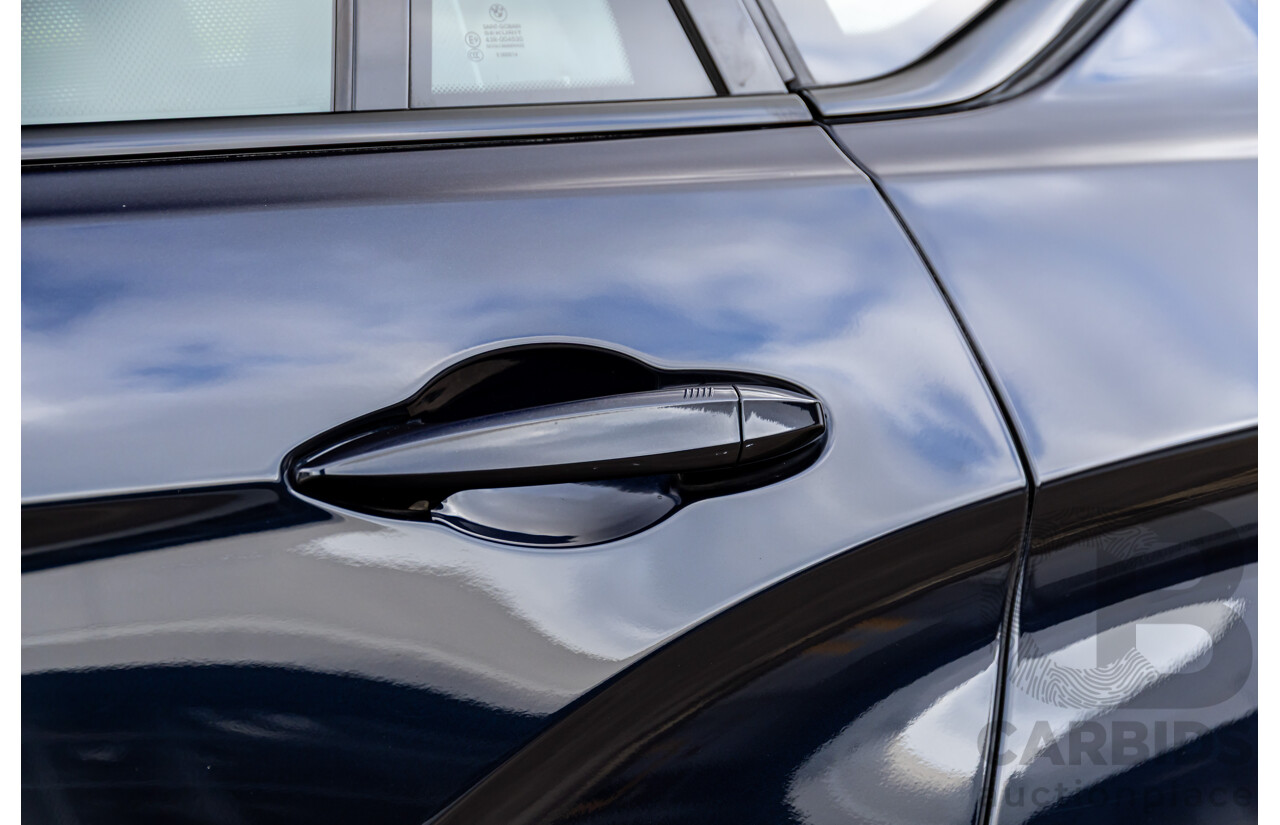 11/2014 BMW X6 M50d E71 MY14 4d Coupe Carbon Black Metallic Triple Turbo Diesel 3.0L