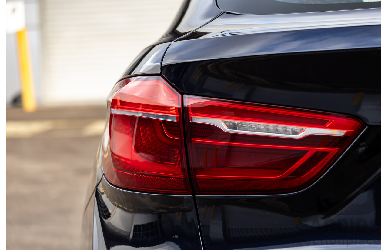11/2014 BMW X6 M50d E71 MY14 4d Coupe Carbon Black Metallic Triple Turbo Diesel 3.0L