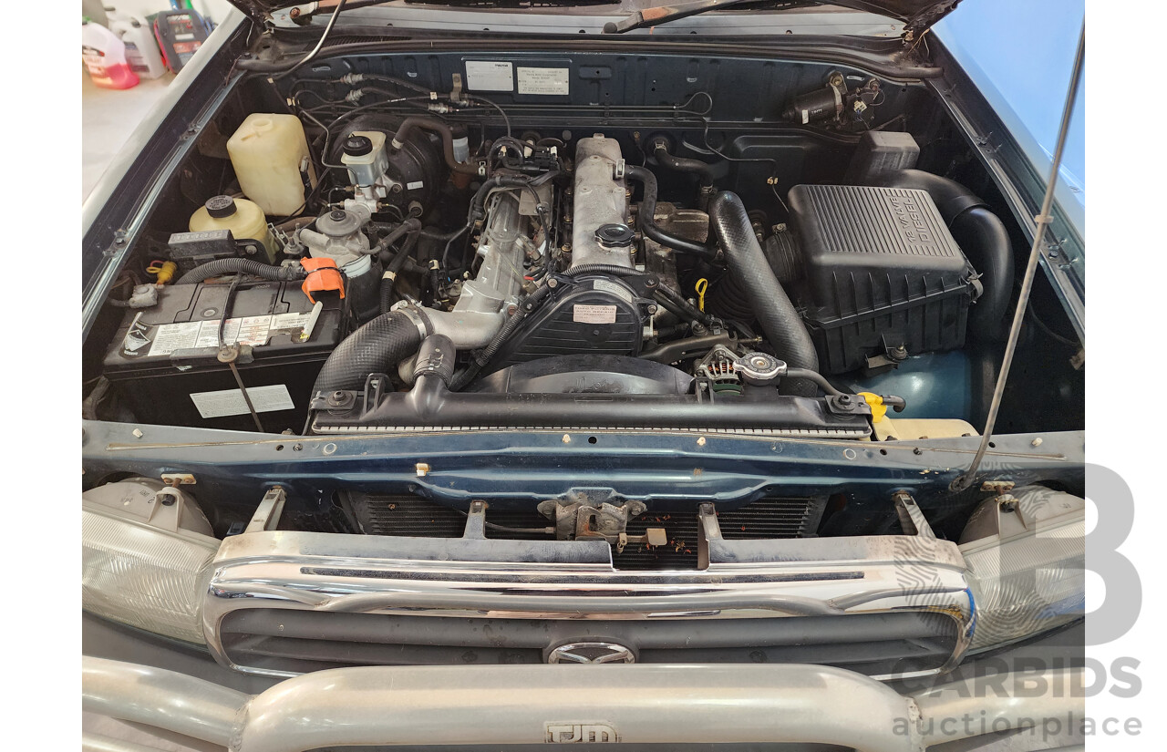 12/1999 Mazda B2500 Bravo (4x4)  Dual Cab P/Up Green 2.5L