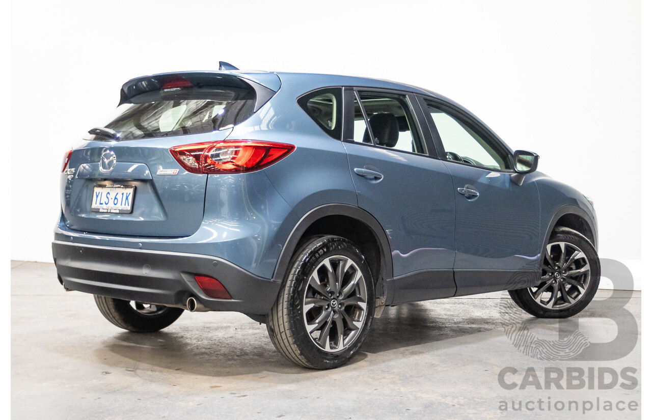 9/2016 Mazda CX-5 Akera (AWD) Series 2 KE MY15 4d Wagon Reflex Blue Twin Turbo Diesel 2.2L