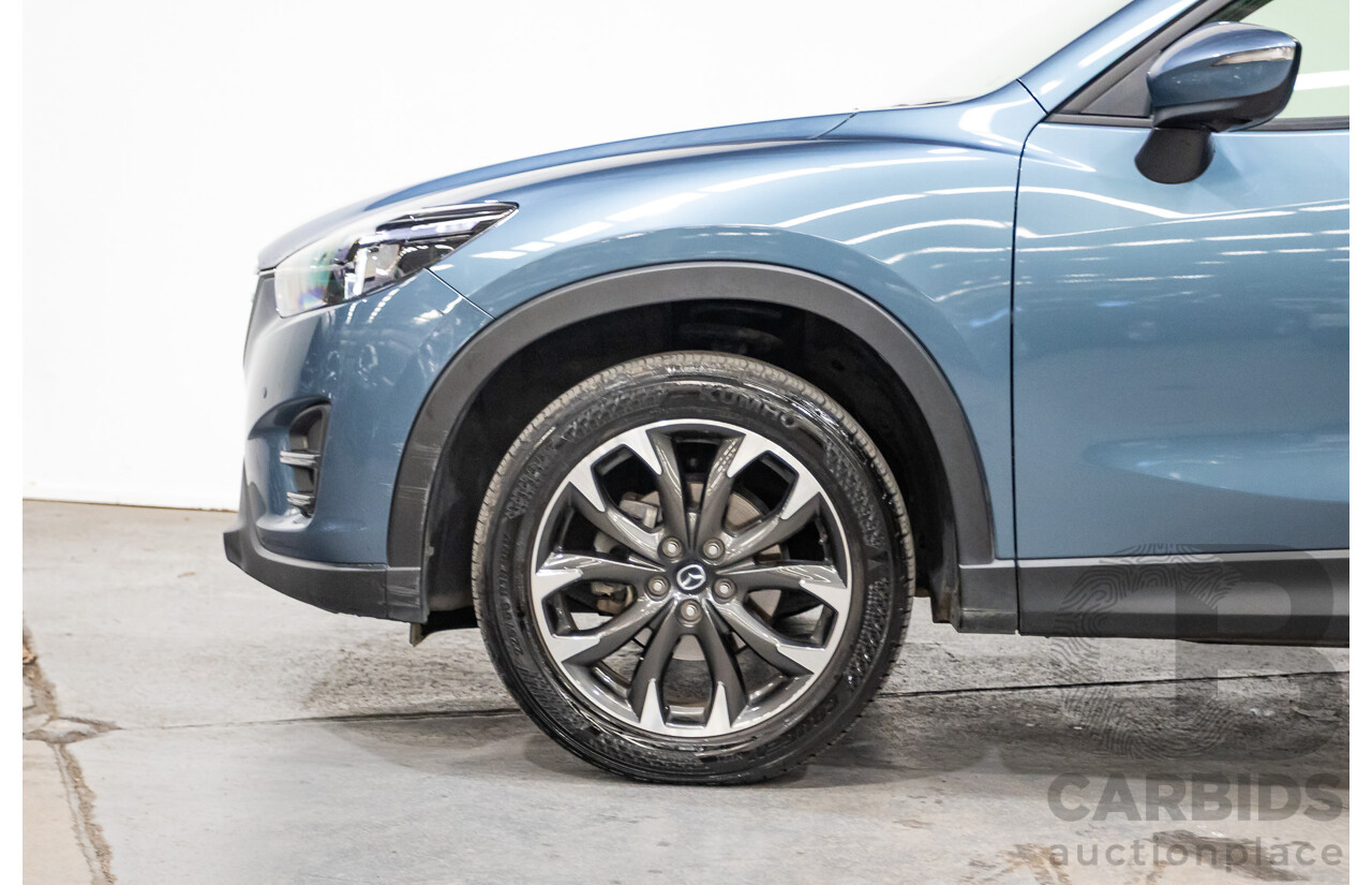 9/2016 Mazda CX-5 Akera (AWD) Series 2 KE MY15 4d Wagon Reflex Blue Twin Turbo Diesel 2.2L