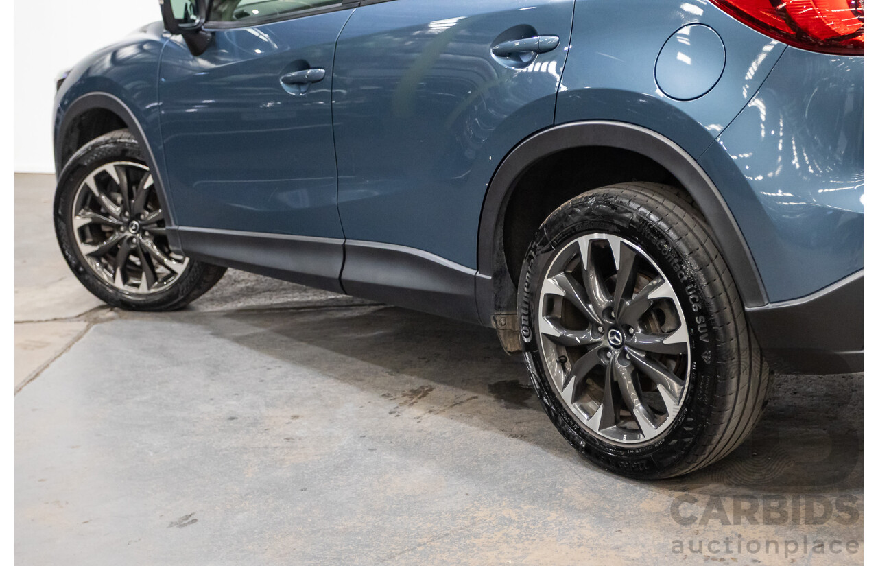 9/2016 Mazda CX-5 Akera (AWD) Series 2 KE MY15 4d Wagon Reflex Blue Twin Turbo Diesel 2.2L