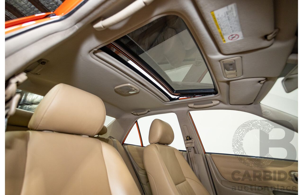 9/2001 Lexus IS200 GXE10R 4d Sedan Sunburst Orange 2.0L